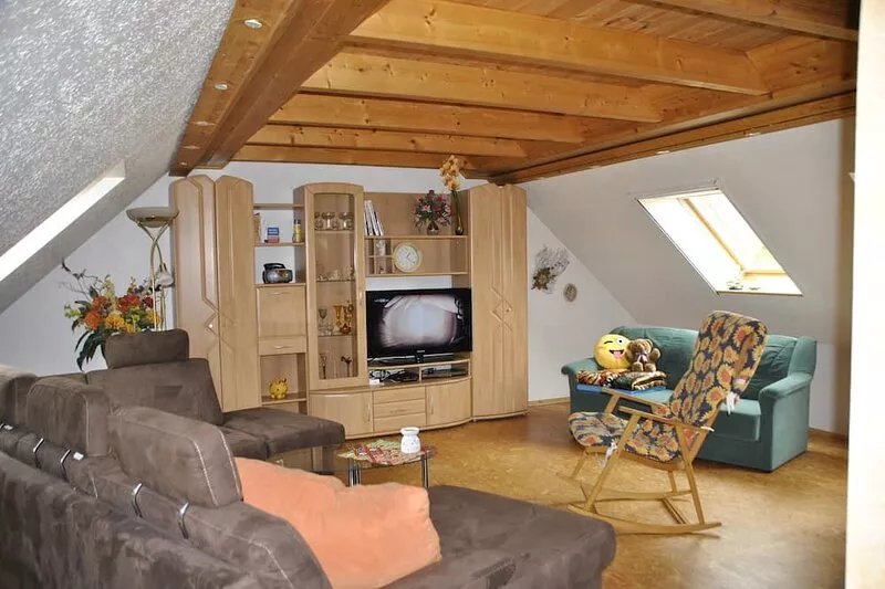 idyllic, sunny apartment at the natural swimming pond and with a fireplace